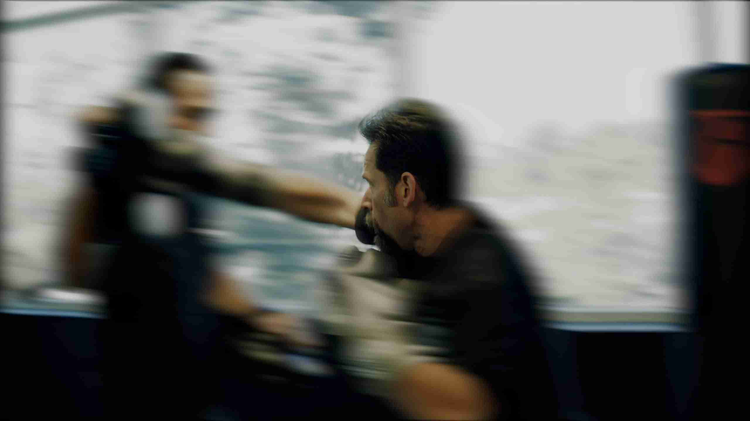 Athletic people doing crossfit training in gym as warm up to krav maga and brazillian jiu jitsu